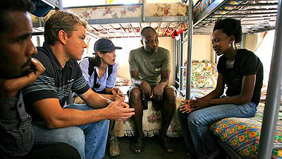 U.S. actor Matt Damon meets Sharon Ruzvid, 18, a Zimbabwean refugee who was raped whilst pregnant, during his visit to the South African border town of Musina in Zimbabwe Tuesday, Marc....