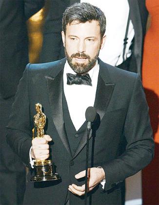 Ben Affleck accepts the Best Picture award for Argo during the Oscars on February 24 .