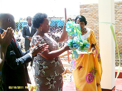 Mutakwasuku commissions the Muhanga Sacco office on Monday.  The New Times/ J. Mukamana.