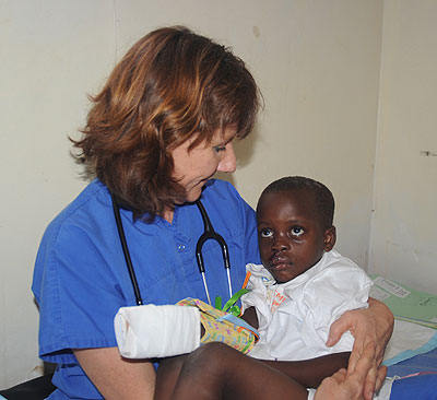 Florence Kuyt with one of her patients after a surgery. The New Times / J. Mbanda.