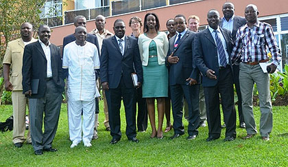 Some of the regional officials who participated in the meeting pose for photo. The New Times/ S. Nkurunziza.