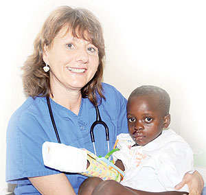 Florence Kuyt with one of her patients after a surgery. The New Times / J. Mbanda.