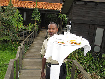 A waiter at Nyungwe Forest Lodge. The hotel is reaping from the five-star status it was awarded in the last grading exercise. The New Times/ Timothy Kisambira