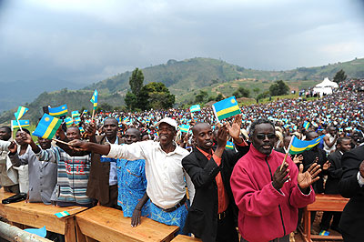 Nyamagabe residents welcome President Kagame (not in photo) in the Southern Province on February 19, 2013.  Debate has been heated over anticipated  change of leadership in 2017. Satur....
