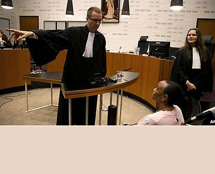 Basebya (seated) during one of the court hearings. Net photo. 