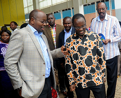Minister  Musoni (L) talks to Ndayisaba after yesterdayu2019s meeting.  The New Times/John Mbanda.