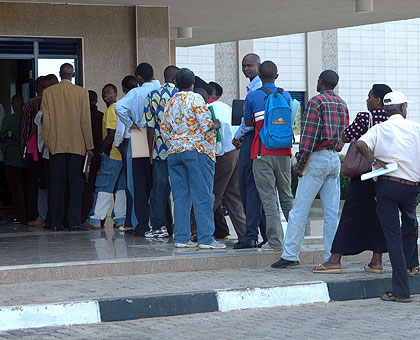 Clients queuing at RRA head offices to pay taxes. The body is calling on businesses in the Northern Province to clear their arrears. The New Times/ File. 