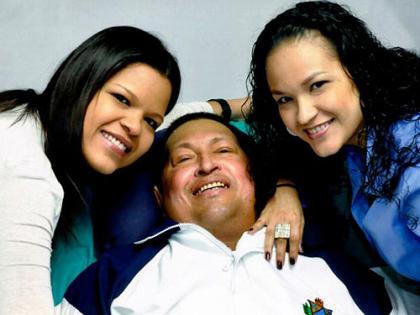 Venezuelan President Hugo Chavez poses for a photo with his daughters, Maria Gabriela, left, and Rosa Virginia at an unknown location in Havana, Cuba, Feb. 14, 2013. It was the last pu....