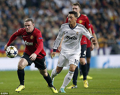 Above: Rooney did not impress Real Madrid in the Bernabeu.   Below: Rooney was left out of the starting line-up against Real Madrid, sparking uncertainty about the 28-year-oldu2019s future at Old Trafford. Net photo.