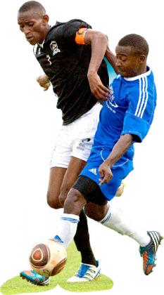 APR's Jean Baptist Mugiraneza battles with Rayon Sport midfielder Fuadi Ndayisenga in the first round match at Amahoro Stadium, which ended 2-2. Saturday Sport/ T. Kisambira.