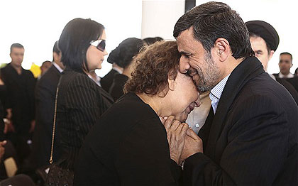 Mahmoud Ahmadinejad offering his condolences to Hugo Chavezu2019s mother Elena Frias. Net photo.