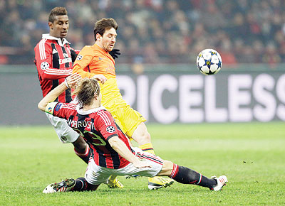Barcelona foraward Lionel Messi was largely kept quiet in the first leg at San Siro.  Net photo.