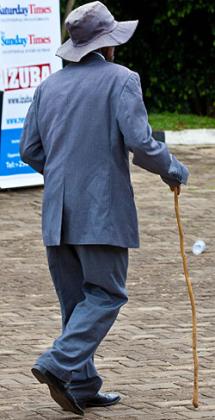 An elderly man leaves a graduation ceremony in Kigali recently. A new law will establish an eldersu2019 forum. The New Times/  Timothy Kisambira.