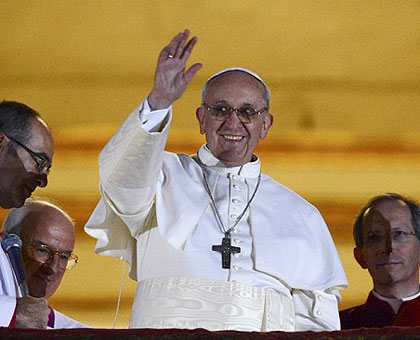 Jorge Bergoglio, now Pope Francis, waves to the crowd from the balcony of St. Peteru2019s Basilica after being named pope yesterday. Net Photo.