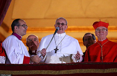Pope Francis addresses the crowd from the central balcony of St. Peteru2019s Basilica  in Vatican City on Tuesday. Net photo.