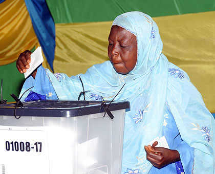 A voter casts her ballot during the presidential polls in 2010.  The New Times/ File. 