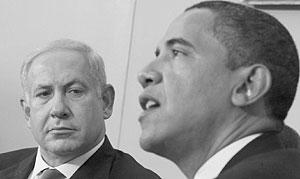 Israeli Prime Minister Benjamin Netanyahu, right, looks towards President Barack Obama as he speaks to reporters in the Oval Office of the White House in Washington. Net photo