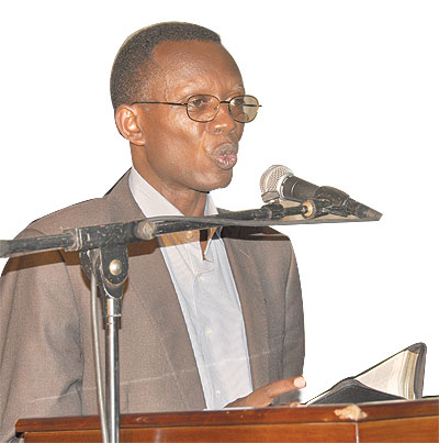 Rev. Antony Rutayisire addresses the congregation at the event. 