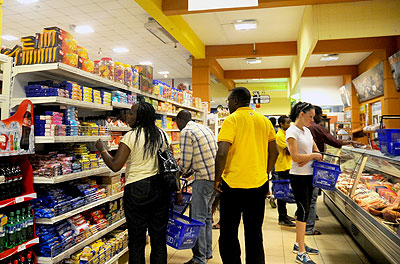 Shoppers pick items in a supermarket. Trade ministry has urged traders to observe standards.
