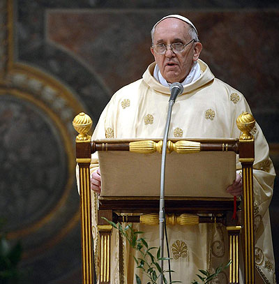 Newly elected Pope Francis leads a mass with cardinals at the Sistine Chapel, in a picture released by  Osservatore Romano at the Vatican on March 14, 2013.  Net photo