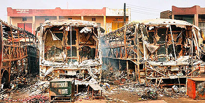 Burnt luxury buses lie in the parking area at New Road bus station in Sabon Gari district in northern Nigerianu2019s largest city of Kano on March 19, 2013.. Net photo.