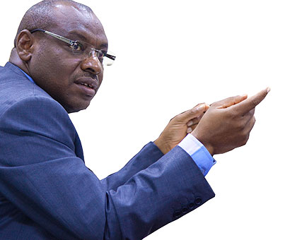 UPWARD: Amb. Gatete briefs journalists about the state of the economy yesterday.  The New Times/ Timothy Kisambira.