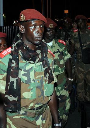 Soldiers from Central African Republicu2019s Seleka rebel group arrive at the airport ahead of planned peace talks with the Central African Republicu2019s government, Libreville, Gabon, Ja....