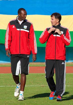 Micho (left) and his assistant Eric Nshimiyimana taking to the field for the second half of Wednesday's friendly match against Libya. Saturday Sport / T. Kisambira.