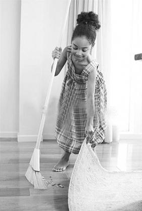 A young girl sweeping the house; a little help is always needed. Net photo.