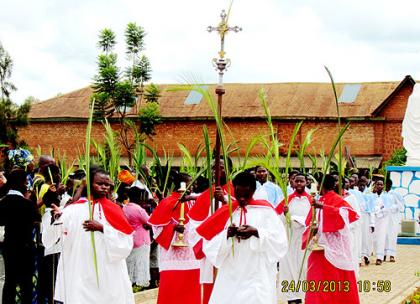 Christians wave palm fronds yesterday while observing Jesusu2019 triumphal entry into Jerusalem.  The New Times/  JP Bucyensenge.