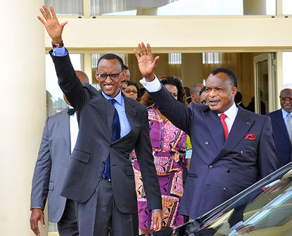 President Kagame and President Sassou N'Guesso greet the crowd at Ollombo Airport in Oyo.  The New Times/Village Urugwiro.