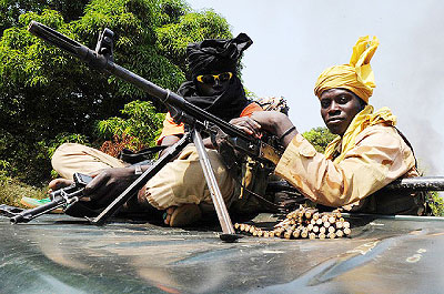 Su00e9lu00e9ka rebels in the Central African Republic patrol near the city of Damar in January. Net photo.