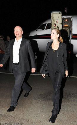 Foreign Secretary William Hague and Oscar-winning actress  Angelina Jolie arrive at Kigali International Airport. Net photo.