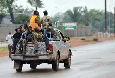 Seleka coalition rebels patrol the streets of Bangui in the Central Africa Republic on March 25, 2013. Net photo. 