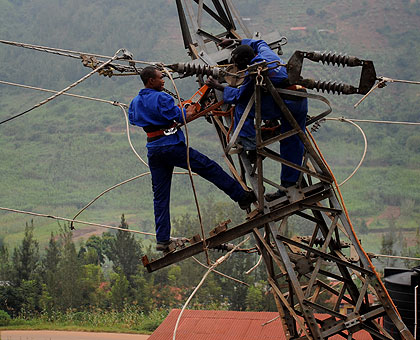 EWSA workers fixing electricity lines in the city recently. The New Times/ File