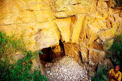 One of the entrances of the u2018sacredu2019 cave in Rubona village, Nyarugenge district, where the faithful converge for worship.   The New Times/ Timothy Kisambira.