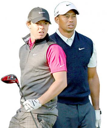 Tiger Woods (right) has overhauled Rory McIlroy (left) at the top of the rankings. Net photo.