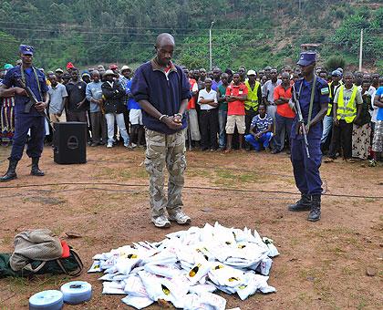 The suspect with his marchandise. The Sunday Times /Laurent Kamana.