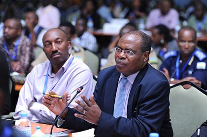 John-Mary Kauzya answers a question after his presentation at the National Leadership Retreat . 