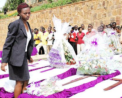 A young survivor honours Genocide victims, among them, her relatives, in a past commemoration period. The New Times/ John Mbanda.