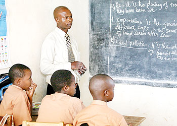 A teacher conducts an English lesson. Similar efforts should be put into teaching Kiswahili across the country. The New Times/File.