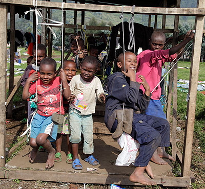 Children play in Nkamira transit camp. The New Times/ Timothy Kisambira.