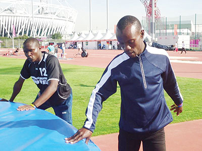NPC athletes Hermans Muvunyi (right) and  Thu00e9oneste Nsengimana in training during the 2012 Paralympic Games in London. Saturday Sport/Pascal Bakomere.