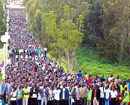 Multitudes of Rwandans who turned up for the Walk To Remember await to start outside the Parliamentary Buildings yesterday. The New Times/  Village Urugwiro.