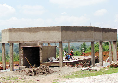 Masons work at a Genocide memorial centre in Kabakobwa. Thousands of fleeing Tutsis from Ngoma commune and the surrounding districts took refuge in a church on the hill, only for the m....