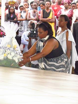 Southern Province Executive Secretary Jeanne Izabiriza lays a wreath in honour of Genocide victims yesterday. The New Times/JP Bucyensenge