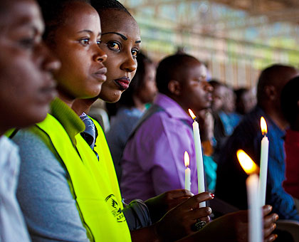 Mourners from Nyarugenge district observe the candle night ceremony in honour of the victims of the 1994 Genocide against the Tutsi. The New Times/ T. Kisambira.