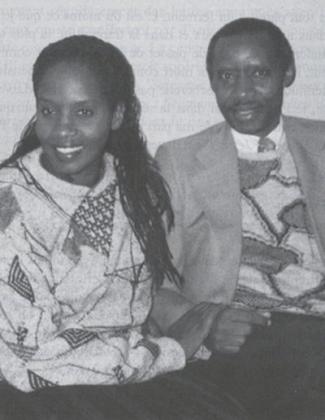   Rugamba (R) with a relative. Net photo.