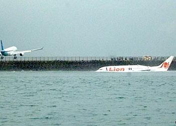 People on other flights landing at Denpasar airport could see the strange sight of a jet lying, apparently intact, just out to sea. Net photo.