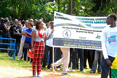 The Rwandan student community in Uganda take part in Walk to Remember at Nkumba University over the weekend. The New Times/ Gashegu Muramira.